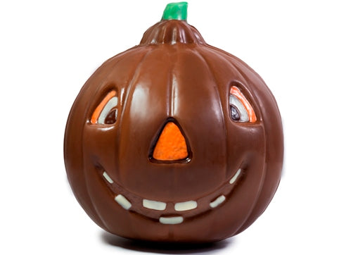 A molded jolly chocolate jack-o-lantern shaped chocolate.