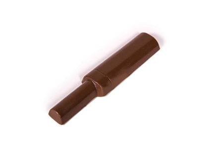 A three-dimensional molded chocolate mascara tube.